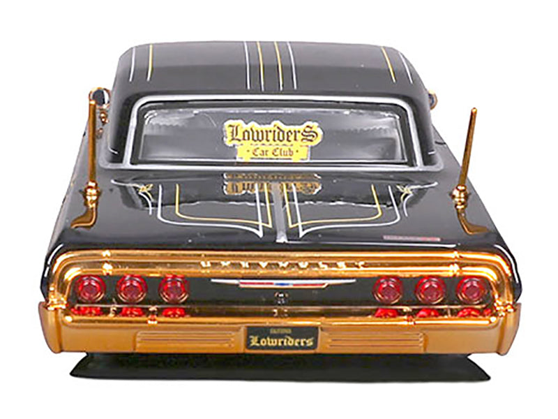 1964 Chevrolet Impala SS Lowrider Black Metallic with Gold Graphics and Gray Interior "Lowriders" "Maisto Design" Series 1/26 Diecast Model Car by Maisto